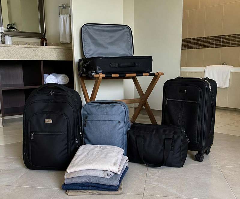 Luggage placed on hard hotel bathroom tile to prevent bed bug hitchhikers